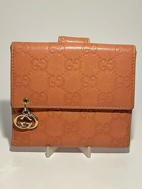 Gucci Compact Bifold Wallet GG Embossed Pink Shima Leather with Gold Charm
